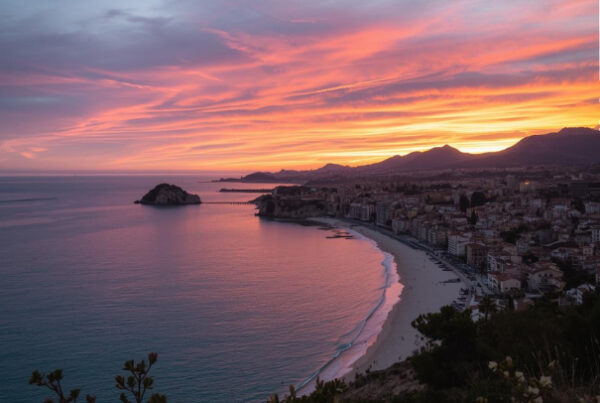 Sunset over a beach and city
