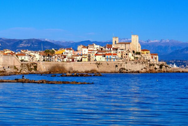 Antibes old town ramparts overlooking the Mediterranean Sea with the Alps in the background